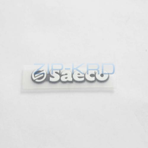 Saeco Позво.серебряная пластина с логотипом Saeco Нпр